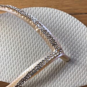 White Havaianas with Swarovski crystals.
